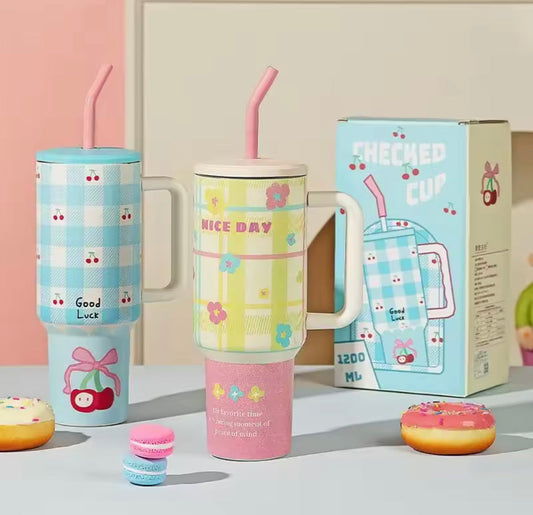 1200ml stainless steel tumbler with colorful checkered patterns and pink straws by Clarify.pk