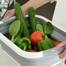 Clarify.pk 2 in 1 Cutting board and foldable wash basin filled with fresh vegetables