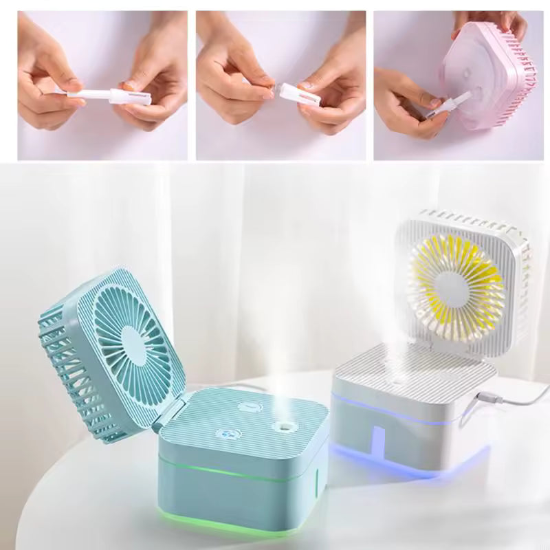 2-in-1 humidifier cooling fan in blue and pink with USB connection and mist output on a white table