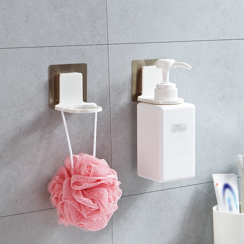 2 pieces wall mounted shampoo holder by Clarify.pk holding soap dispenser and pink bath sponge on gray bathroom wall