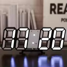 3D LED digital wall clock by Clarify.pk with large bright white digits showing time in modern design