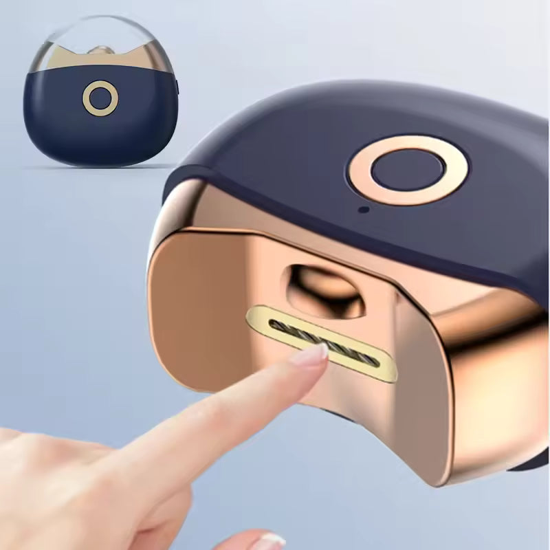 Clarify.pk automatic electric nail clipper in sleek black and gold design with easy fingertip operation