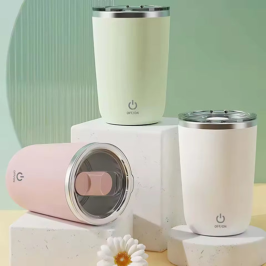 Clarify.pk automatic self stirring mug in pastel green, white, and pink with stainless steel lids
