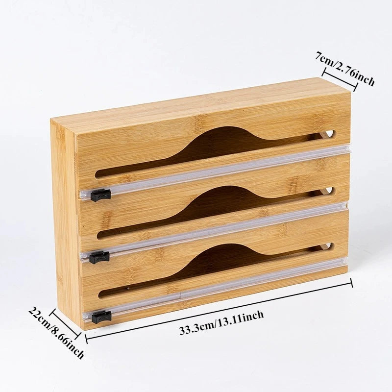 Clarify.pk bamboo wrap dispenser with cutter and three compartments for kitchen wrap organization