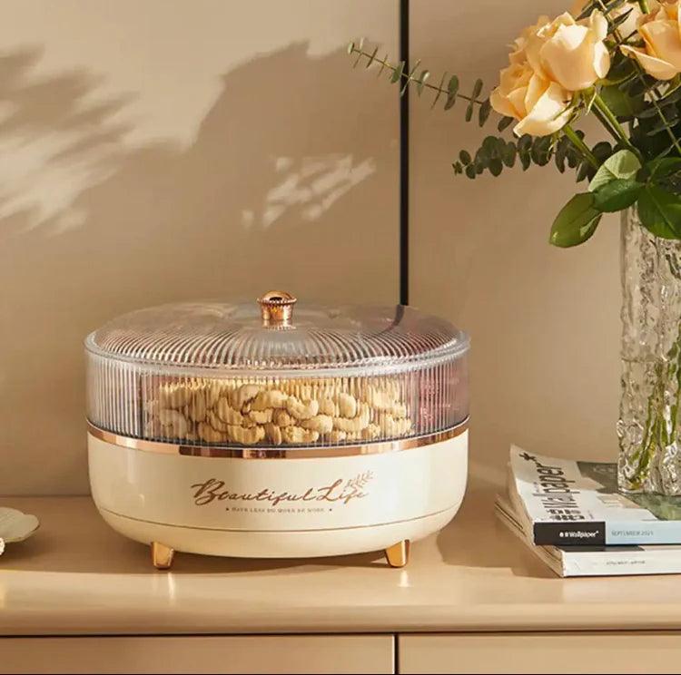 Clarify.pk luxury dry fruit tray in cream color with transparent lid filled with assorted nuts on wooden table
