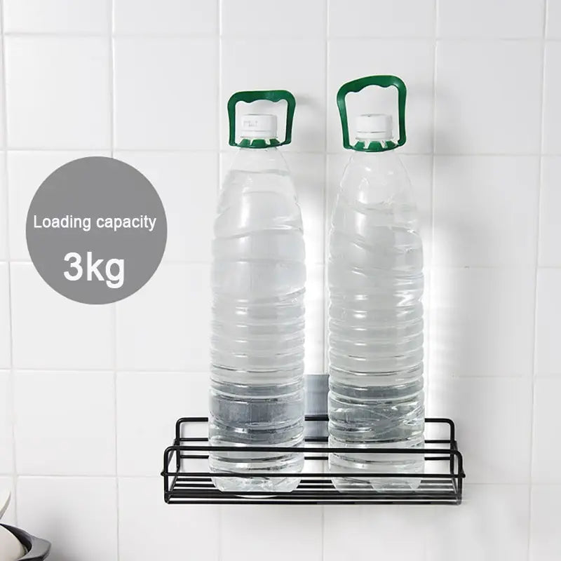 Black bathroom shelf organizer mounted on tiled wall holding two water bottles with 3kg loading capacity