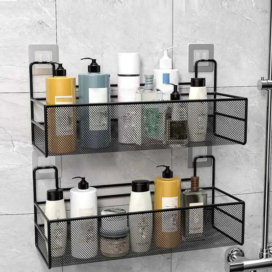 Black metal mesh wall mounted bathroom shelf with two tiers holding various toiletry bottles