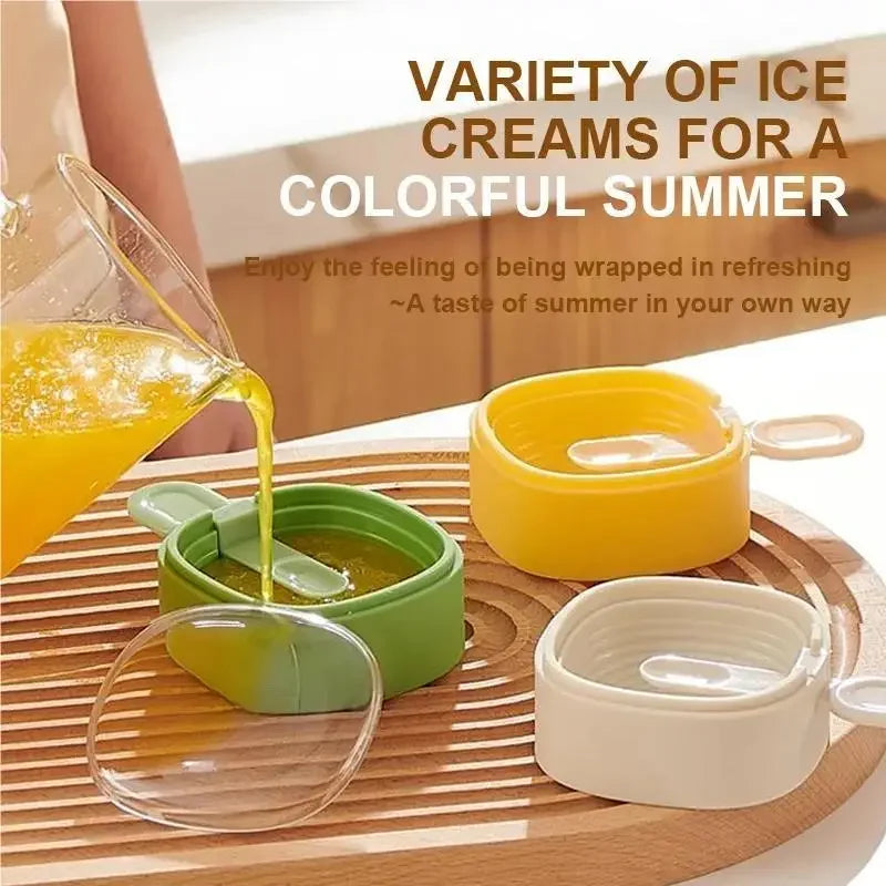 cat paw ice cream mold pack of 2 by Clarify.pk in green yellow and white colors on wooden tray