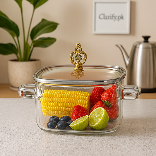 Clear borosilicate glass cooking pot with lid filled with strawberries corn lime and blueberries