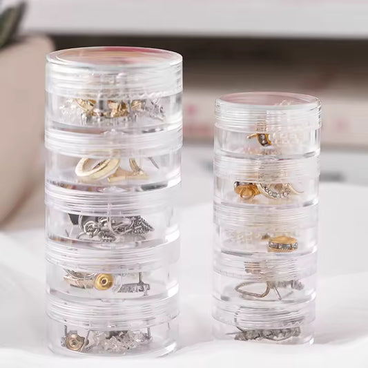 Clarify.pk 5 layer jewelry storage box with clear stackable compartments holding various jewelry pieces