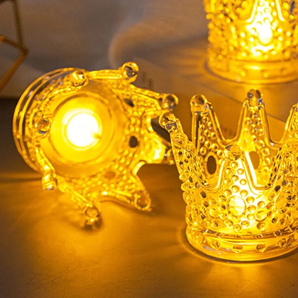 Golden crown night light decor with intricate design glowing warmly on surface
