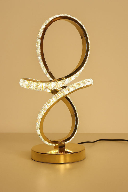 Clarify.pk modern decorative table lamp with gold finish and curved LED light design