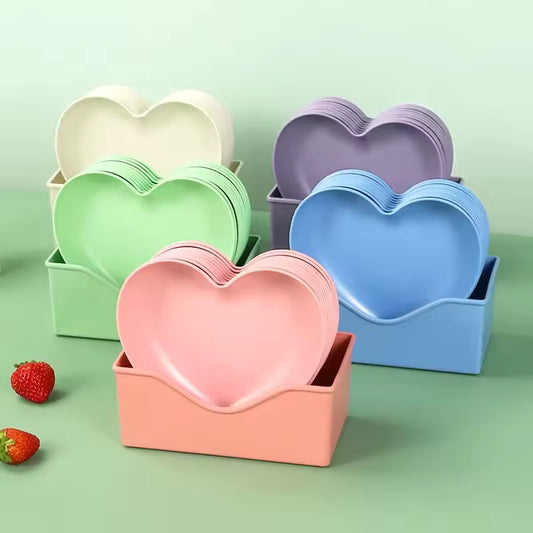 Colorful heart dish pack of plastic plates in pastel colors by Clarify.pk with storage trays