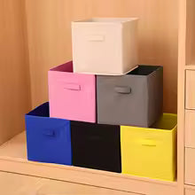 Colorful non-woven storage basket with handle set neatly stacked on wooden shelf