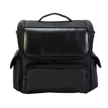 Black waterproof PU leather makeup bag by Clarify.pk with multiple compartments and a handle