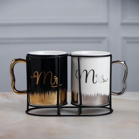 Elegant couple coffee mugs with stand featuring Mr and Mrs designs in black and white with gold accents