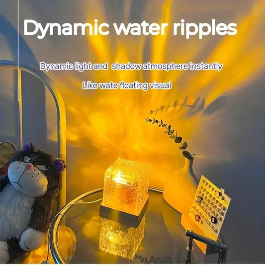 16 color night lamp creating dynamic water ripples light effect on table with plush toy and plant