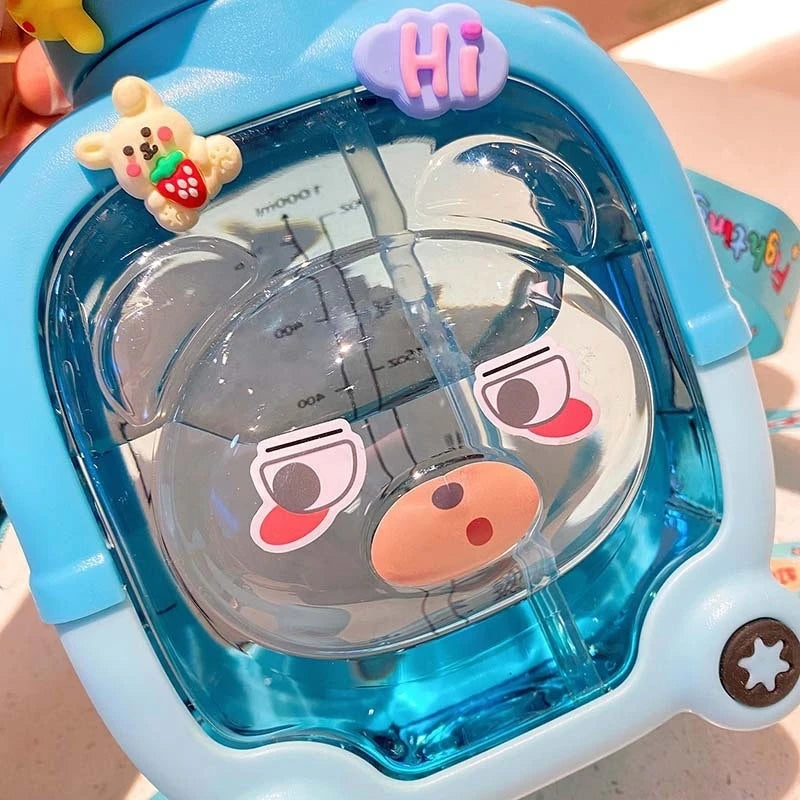 Cute bear water cup for kids in blue with playful bear face and colorful decorations