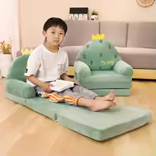 Cute cartoon children sofa in green with crown design suitable for kids to sit and relax