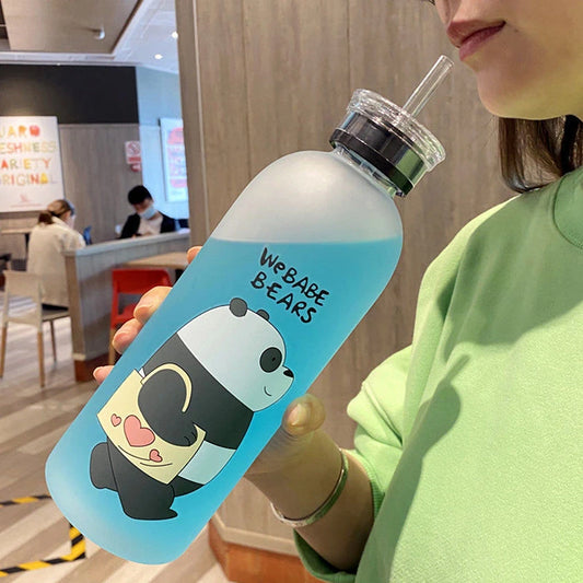Cute Cartoon Drinkware blue water bottle with panda design held by person in green shirt