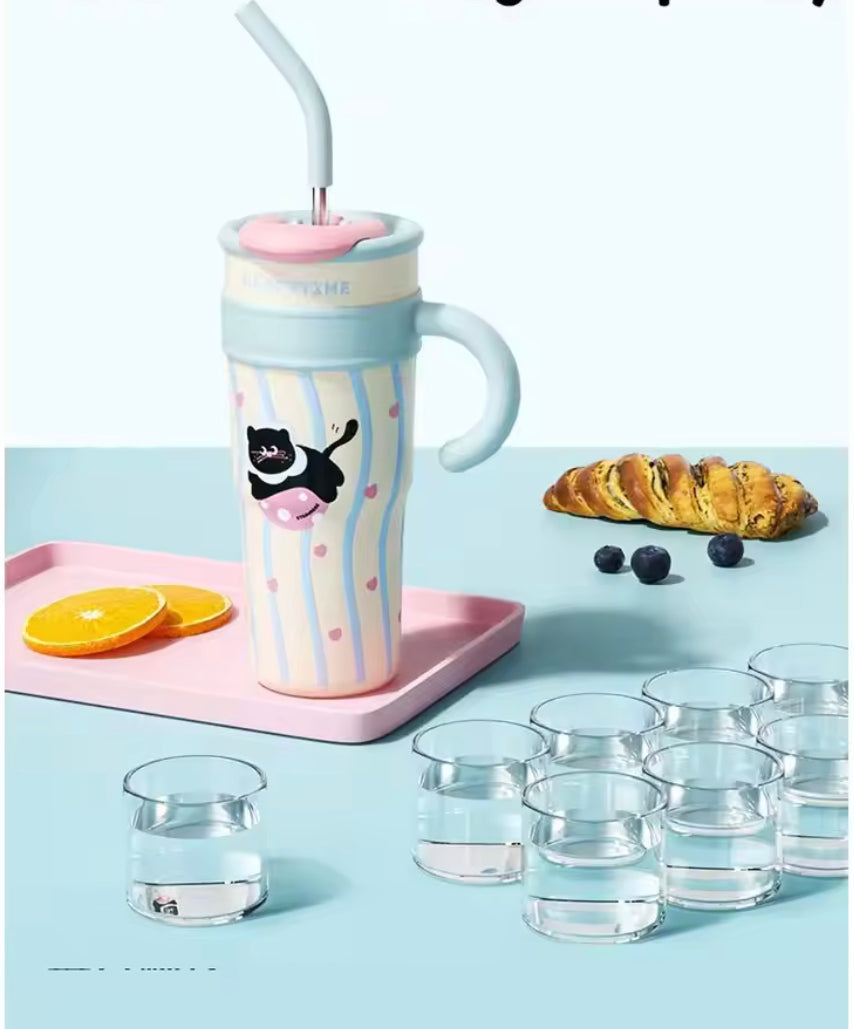 Cute stainless steel tumbler with straw featuring a black cat design on pastel stripes