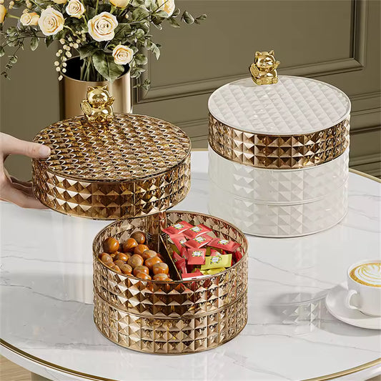 Clarify.pk desktop 4 Layer rotating jewelry organizer in gold and white on a marble table with flowers