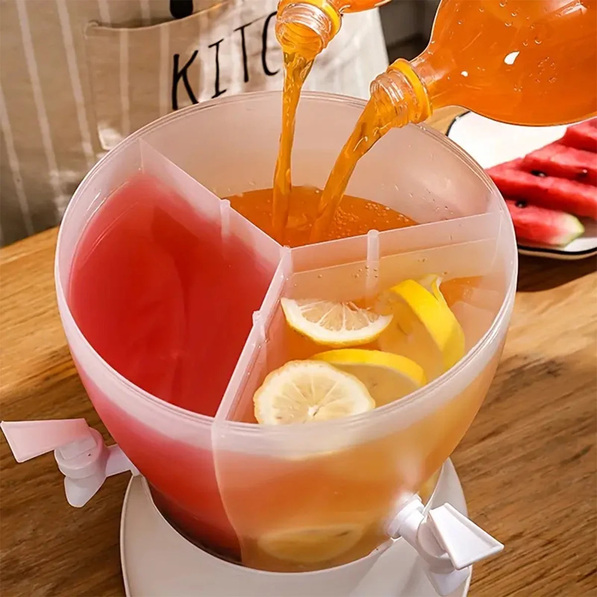 Clarify.pk divider design beverage container with three compartments dispensing different juices and lemon slices