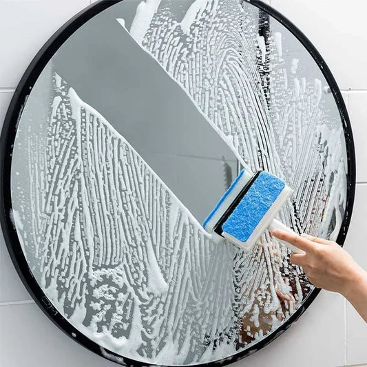 Clarify.pk double sided glass cleaning brush wiping soap off a round mirror with hand