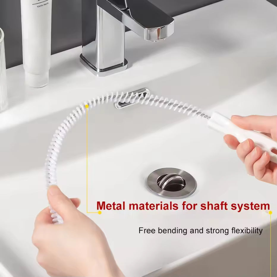 Flexible drain clog remover tool made with metal shaft system held over a white sink
