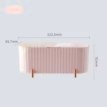 Clarify.pk dustproof makeup organizer box in light pink with ribbed design and gold-tone legs