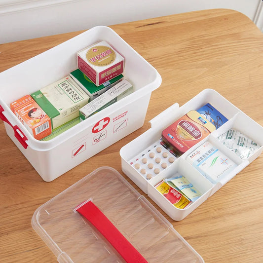 Clarify.pk white first aid kit storage box with multiple compartments and medical supplies inside