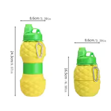Foldable silicone bottle 700ml in yellow with green cap and carabiner for easy carrying