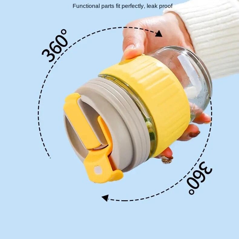 350ml cute travel mug with yellow and gray leak proof lid held in hand showing 360 degree rotation