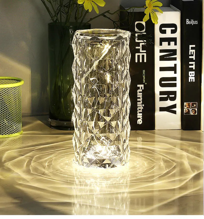 Clarify.pk crystal diamond table lamp with intricate geometric design creating light patterns on surface