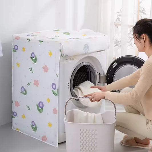 Floral printed drum washing machine cover protecting washing machine with woman loading laundry