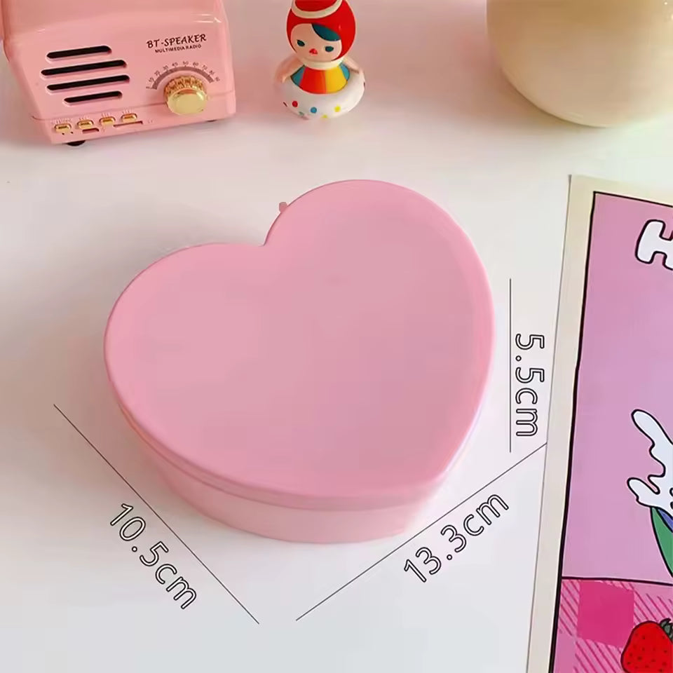 Pink heart shaped jewelry storage box by Clarify.pk with compact dimensions for organizing accessories
