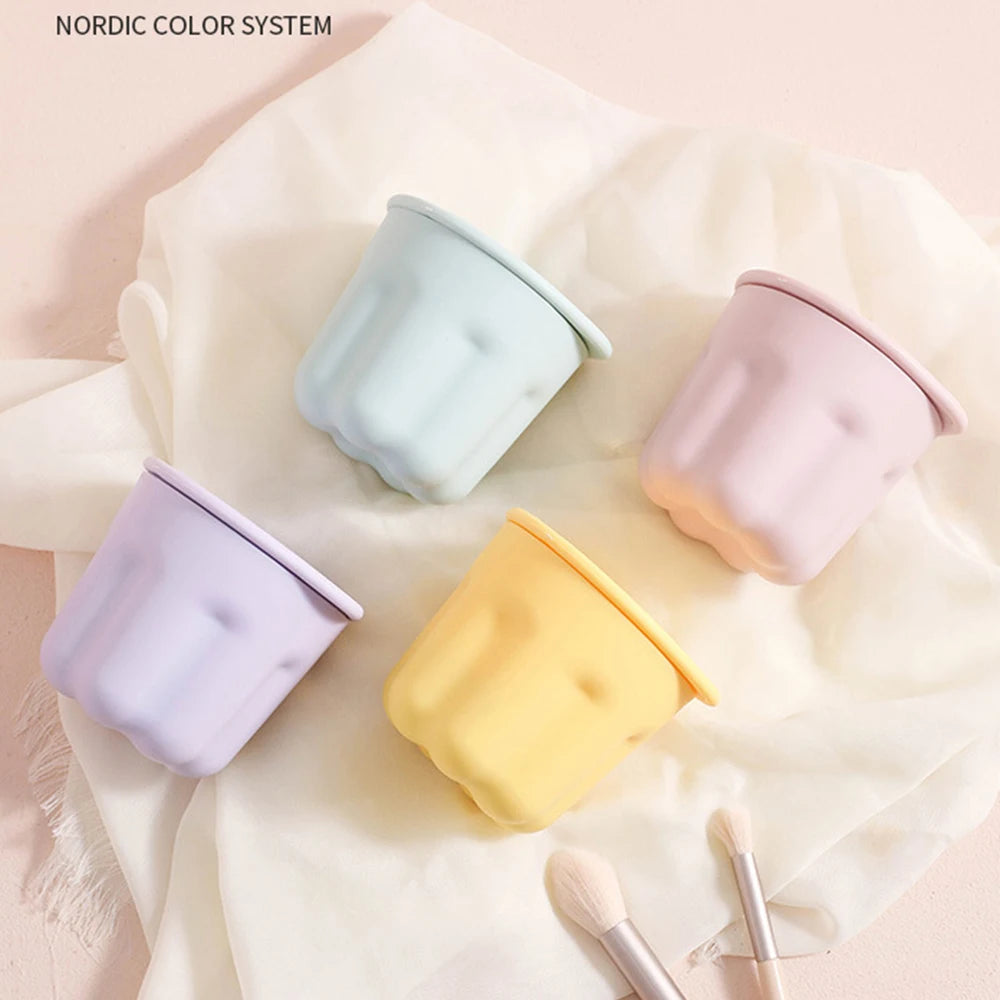 Clarify.pk colorful makeup brush cleaner box set in pastel blue pink purple and yellow on white fabric
