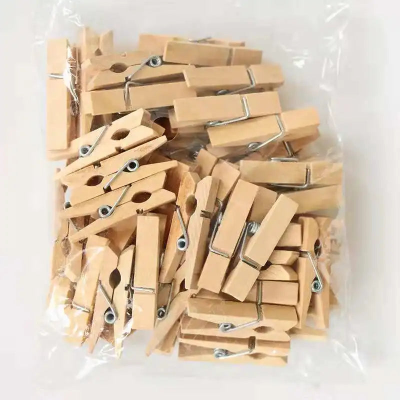 Pack of Clarify.pk mini wooden craft clips made of natural wood for versatile garment and craft use
