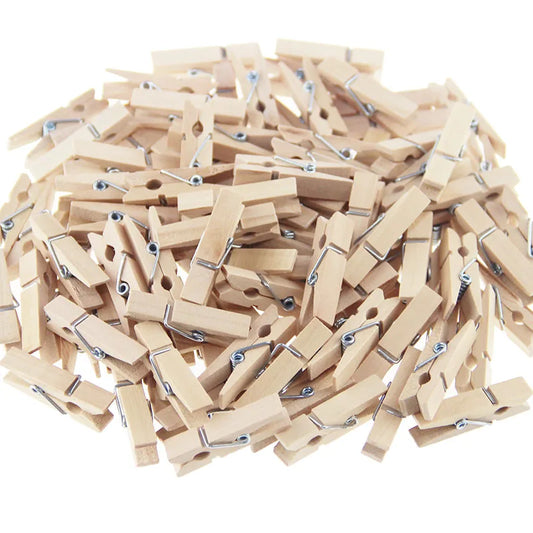 Clarify.pk mini wooden craft clips in natural wood color for hanging and crafting projects