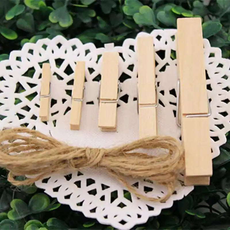 Set of mini wooden craft clips in various sizes with twine on decorative lace paper from Clarify.pk