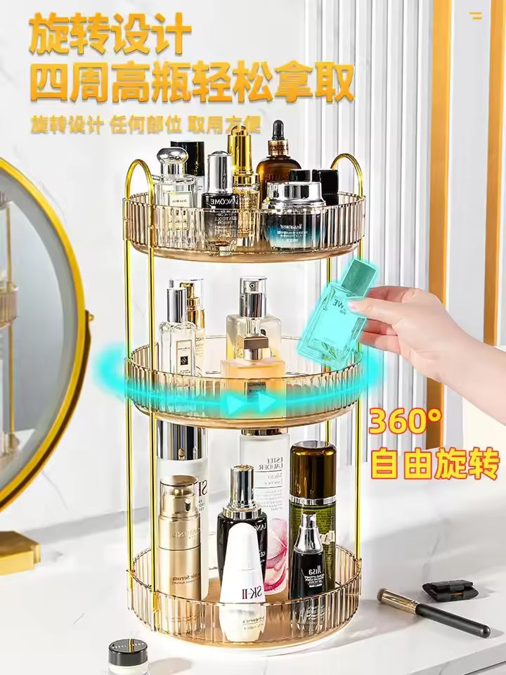 Tao tao Store 3 tier cosmetics organizer in gold metal with rotating trays holding skincare bottles