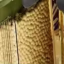 Close-up view of a Clarify.pk grain storage container with textured surface for secure grain preservation
