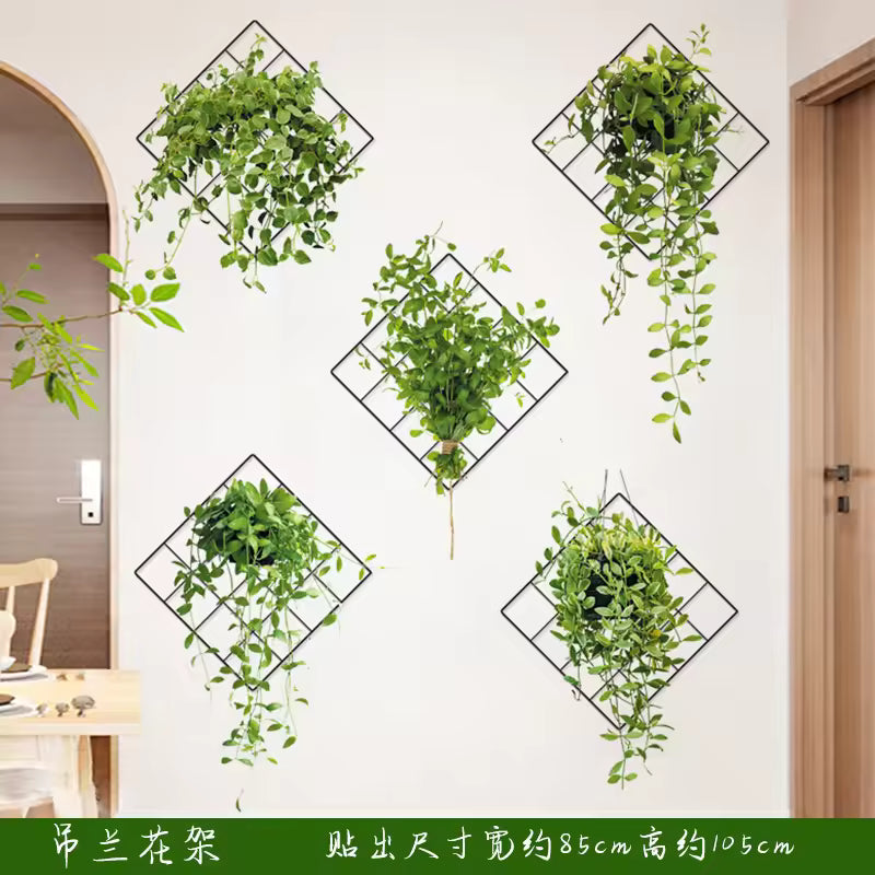 Decorative green plant wall stickers arranged on black grid frames for interior wall decoration
