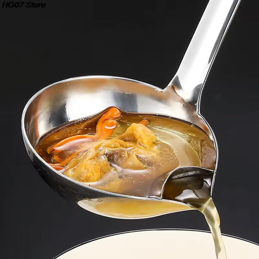 Clarify.pk stainless steel oil separator spoon draining oil from cooked food into a bowl