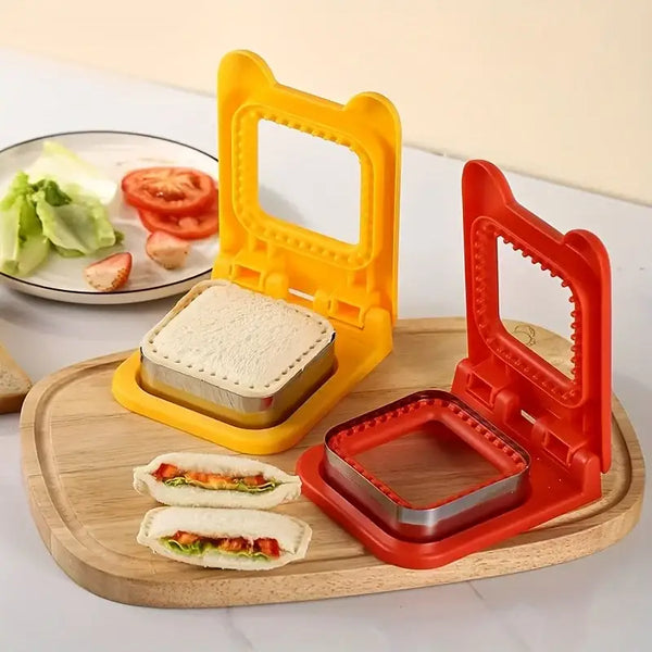 Yellow and red bear ear square sandwich cutter and sealer set with metal insert on wooden board sliced sandwiches
