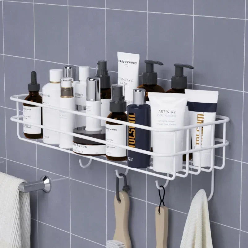 Japanese style bathroom rack mounted on tiled wall holding skincare and hygiene bottles with hanging hooks