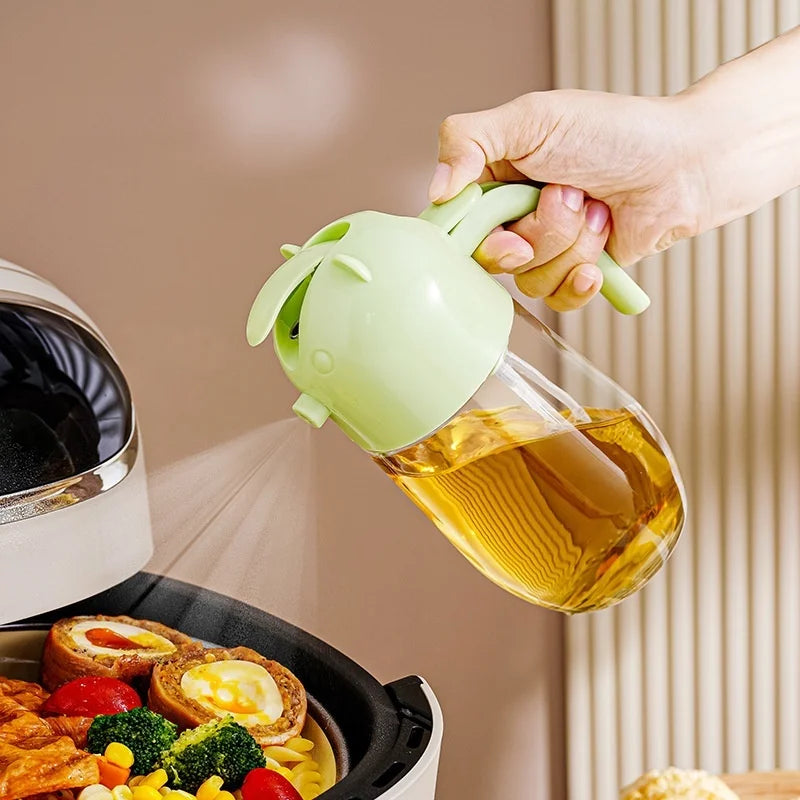 Clarify.pk 2 in 1 olive oil dispenser spraying oil on cooked vegetables and meat in a pan