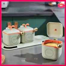 3 piece spice container set for kitchen with square white containers and gold accents on a white tray
