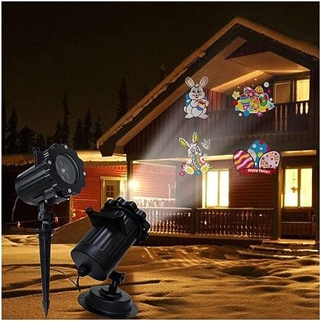 16 pattern stage and lawn lamp projecting colorful Easter-themed designs on house exterior at night