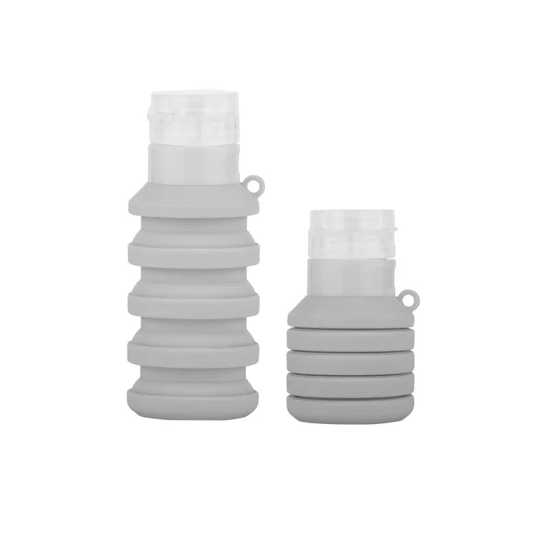 Gray collapsible leakproof refillable shampoo bottle set with secure caps for travel use